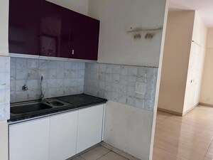 Kitchen in 3.5 BHK Apartment at Gaur Sportswood, Sector 79 – for Rent