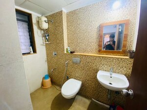 Bathroom in 2 BHK Apartment at Lodha Downtown, Dombivli East – for Rent