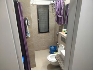 Bathroom in 3 BHK Apartment at Sunteck Gilbird, Andheri West – for Rent