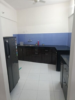 Kitchen in 2 BHK Apartment at Gera Emerald City, Kharadi – for Rent