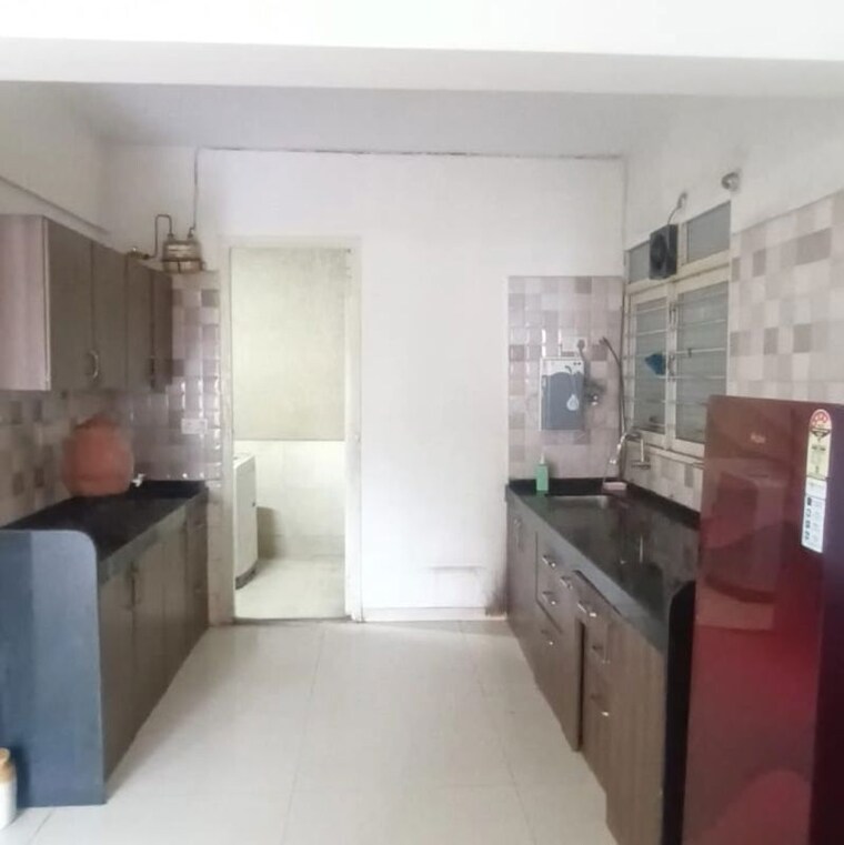 Kitchen, shriram-la-tierra 2 Bedroom 1030 Sq.Ft. Apartment In Dhanori Pune 10436865