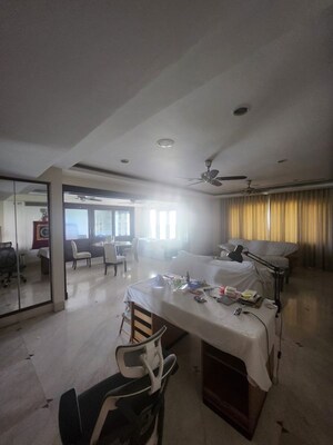 Living Room in 4 BHK Apartment at Ambience Caitriona, Sector 24 – for Sale