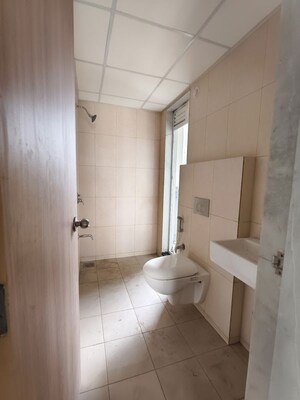 Bathroom in 2 BHK Apartment at Godrej Emerald, Ghodbunder Road – for Rent