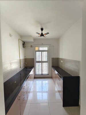 Kitchen in 2 BHK Apartment at Godrej Emerald, Ghodbunder Road – for Rent