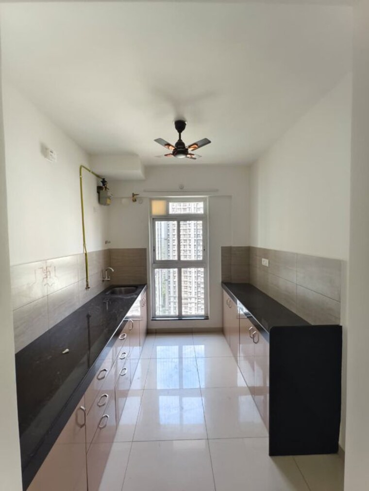 Kitchen, godrej-emerald 2 Bedroom 800 Sq.Ft. Apartment In Ghodbunder Road Thane 10436178