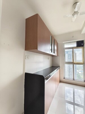 Kitchen in 3 BHK Apartment at Godrej Emerald, Ghodbunder Road – for Rent