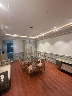 Living Room in 4 BHK Apartment at Ambience Caitriona, Sector 24 – for Sale