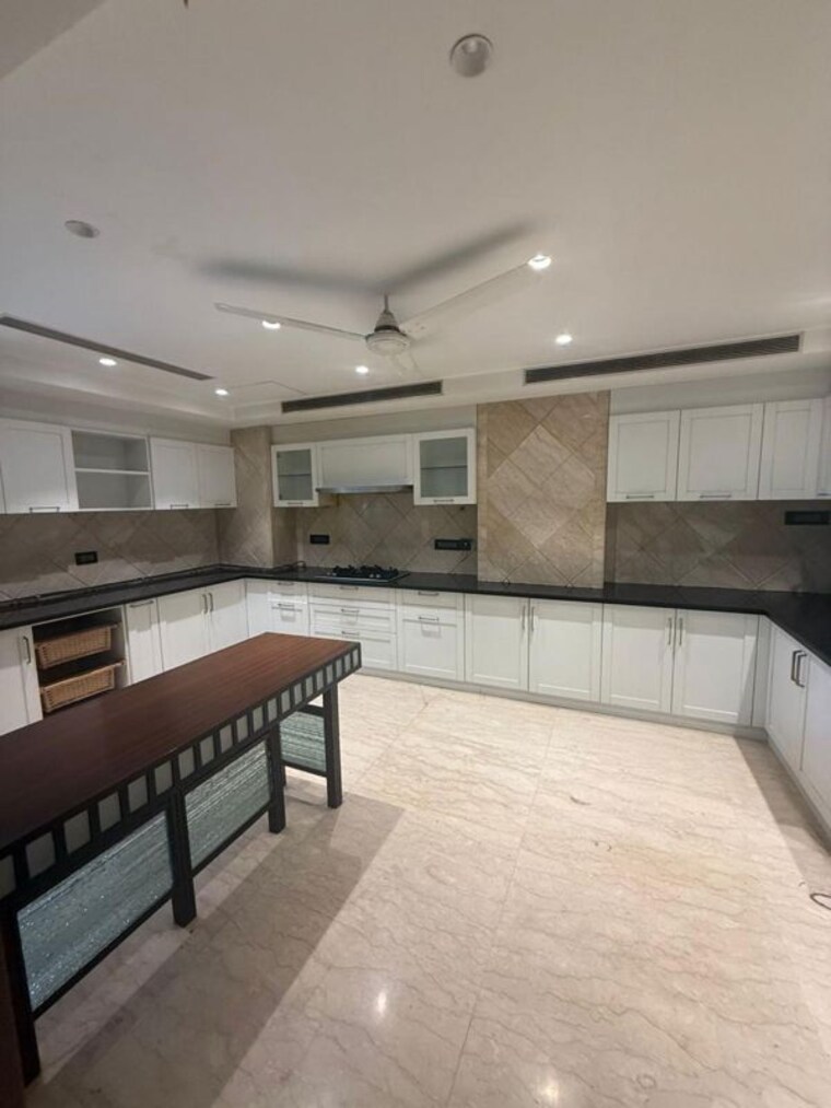 Kitchen, ambience-caitriona 4 Bedroom 7000 Sq.Ft. Apartment In Sector 24 Gurgaon 10436904