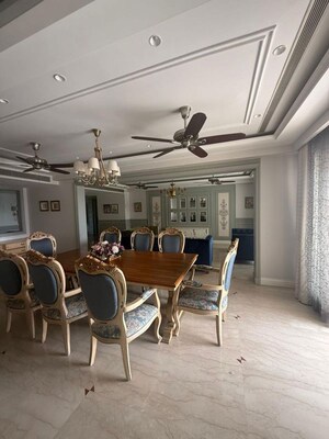Living Room in 4 BHK Apartment at Ambience Caitriona, Sector 24 – for Sale