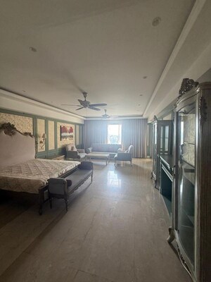 Living Room in 4 BHK Apartment at Ambience Caitriona, Sector 24 – for Sale