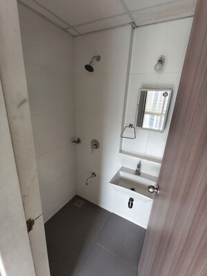 Bathroom in 3 BHK Apartment at Godrej Emerald, Ghodbunder Road – for Rent