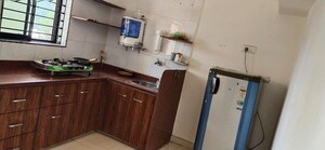 Kitchen in 2 BHK Apartment at Prahlad Nagar – for Rent
