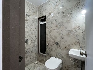 Bathroom in 2 BHK Apartment at Shraddha Priva, Mulund West – for Rent
