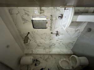 Bathroom in 1 BHK Apartment at Chattarpur – for Sale