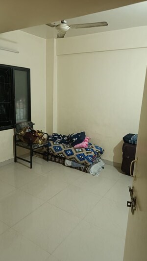 Bedroom in 1 BHK Apartment at Ganesh Park, Dhankawadi – for Sale