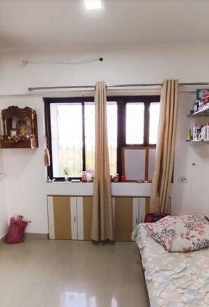 Bedroom in 2 BHK Apartment at Cosmos Heritage, Manpada – for Rent