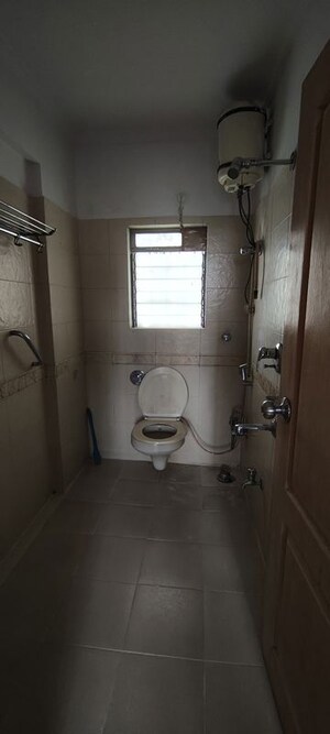 Bathroom in 2 BHK Apartment at Cosmos Harmony, Majiwada – for Rent