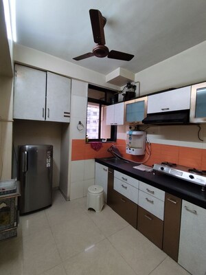 Kitchen in 1 BHK Apartment at Sai Baba Vihar Complex, Ghodbunder Road – for Rent
