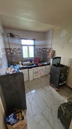 Kitchen in 1 BHK Apartment at Wonder Bharati Vihar, Katraj – for Rent