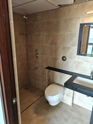 Bathroom in 3 BHK Apartment at Puravankara Purva Atmosphere, Thanisandra Main Road – for Rent