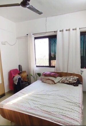Bedroom in 2 BHK Apartment at Cosmos Heritage, Manpada – for Rent