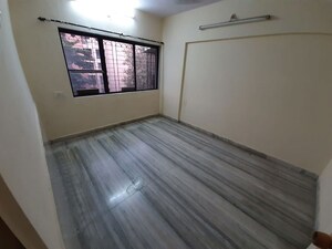 Room in 1 BHK Apartment at Link Palace, Malad West – for Rent