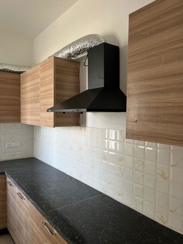 Kitchen, signature-global-golf-greens 2.5 Bedroom 1100 Sq.Ft. Apartment In Sector 79 Gurgaon 10437440