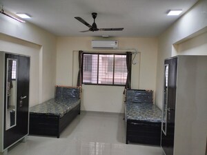 Living Room in 1 BHK Apartment at Omkar Signet, Malad East – for Rent
