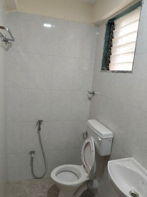 Bathroom in 1 BHK Apartment at Omkar Signet, Malad East – for Rent