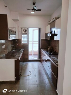 Kitchen in 3.5 BHK Apartment at Elite Golf Green, Sector 79 – for Rent