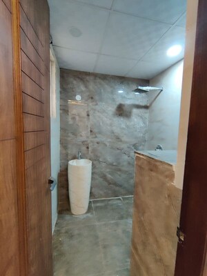 Bathroom in 4 BHK Builder Floor at Green Fields Colony – for Rent