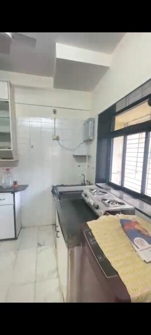 Kitchen in 1 BHK Apartment at Acme Aalap, Vile Parle West – for Rent