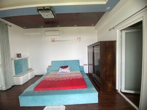 Bedroom in 4 BHK Penthouse at Aman Luxury Apartments, Sahastradhara Road – for Sale