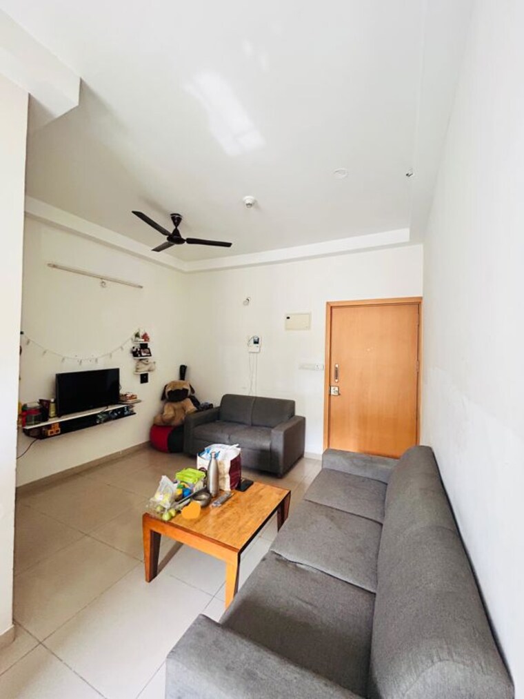 Living Room, mantri-celestia 2 Bedroom 850 Sq.Ft. Apartment In Gachibowli Hyderabad 10437805