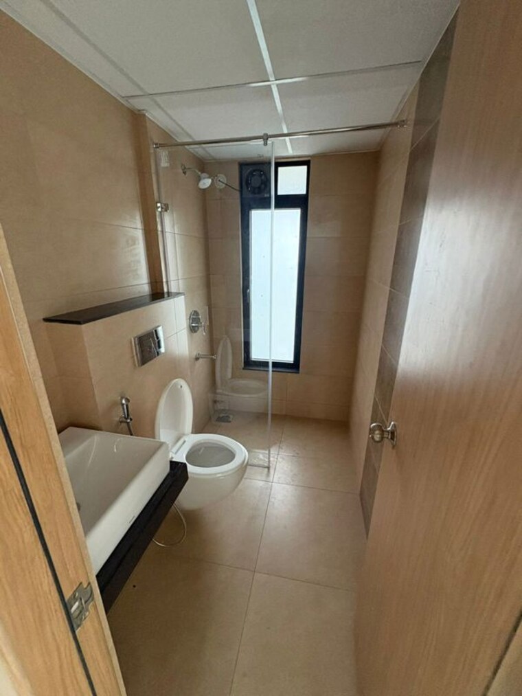 Bathroom, mahindra-nestalgia 3 Bedroom 1100 Sq.Ft. Apartment In Pimpri Pune 10437837