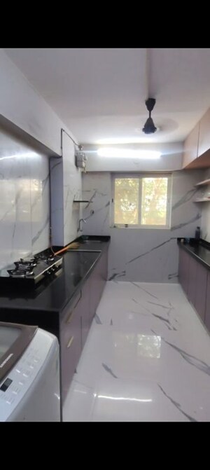 Kitchen in 2 BHK Apartment at Anand Bhavan Vile Parle West, Vile Parle West – for Rent