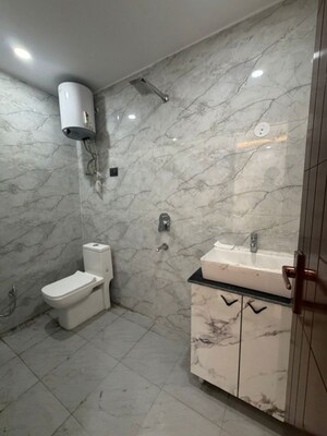 Bathroom in 3 BHK Builder Floor at Hargobind Enclave – for Sale