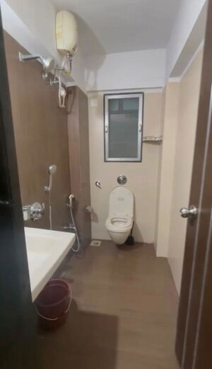 Bathroom in 2 BHK Apartment at Atul Blue Monarch, Andheri East – for Rent
