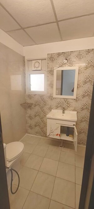 Bathroom in 2.5 BHK Apartment at Supertech Cape Town, Sector 74 – for Rent