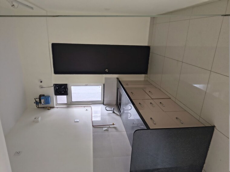 Kitchen, kolte-patil-life-republic-oro-avenue 2 Bedroom 630 Sq.Ft. Apartment In Hinjewadi Pune 10438137