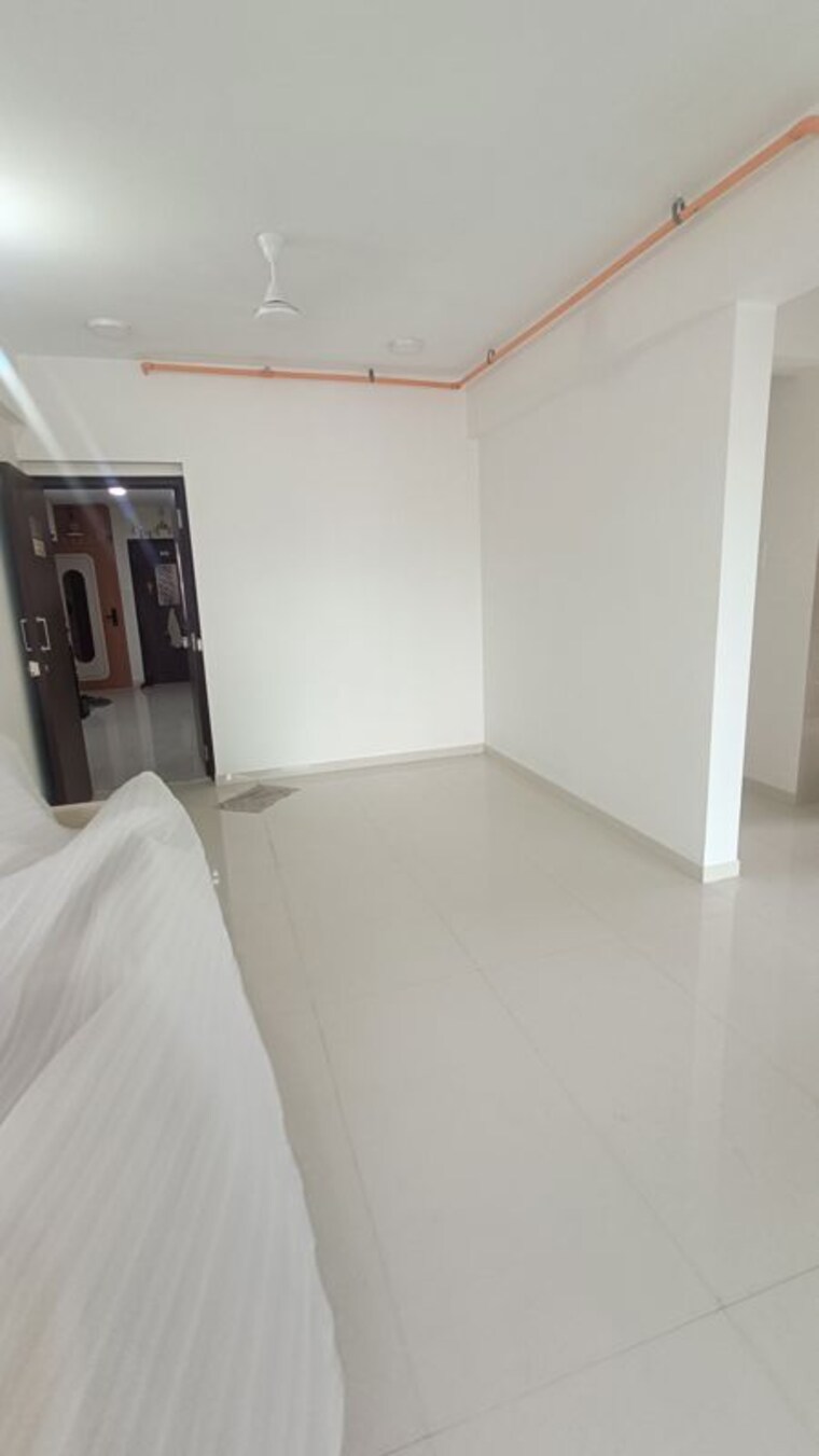 Living Room, khodiyaar-siddharth-nagar-goodwill-chs 2 Bedroom 724 Sq.Ft. Apartment In Goregaon West Mumbai 10438177