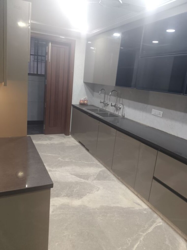Kitchen, punjabi bagh 4 Bedroom 310 Sq.Yd. Builder Floor In Punjabi Bagh Delhi 10438284