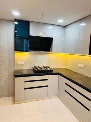 Kitchen in 2 BHK Apartment at JKG Palm Court, Sector 16c Greater Noida – for Rent