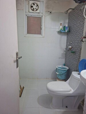 Bathroom in 2 BHK Apartment at JKG Palm Court, Sector 16c Greater Noida – for Rent