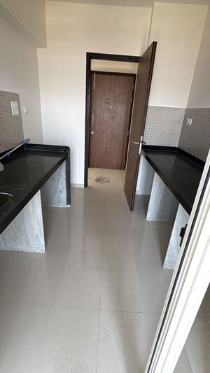Kitchen in 2 BHK Apartment at Lodha Amara, Kolshet Road – for Rent