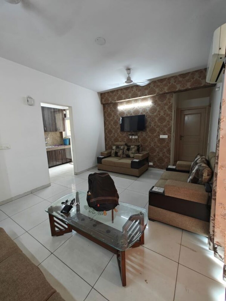 Living Room, krisumi-waterfall-residences 3 Bedroom 1955 Sq.Ft. Apartment In Sector 36a Gurgaon 10438380