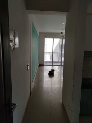 Building Lobby in 2 BHK Apartment at RAS Palm Residency, Sector 76 – for Sale