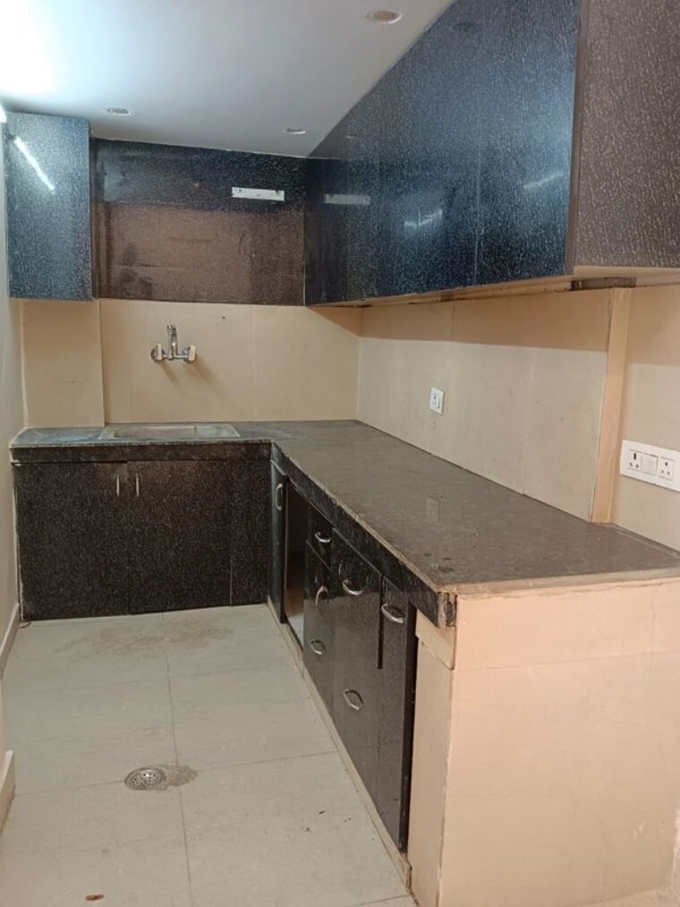 Kitchen, amar colony 2 Bedroom 1009 Sq.Ft. Builder Floor In Amar Colony Delhi 10438566