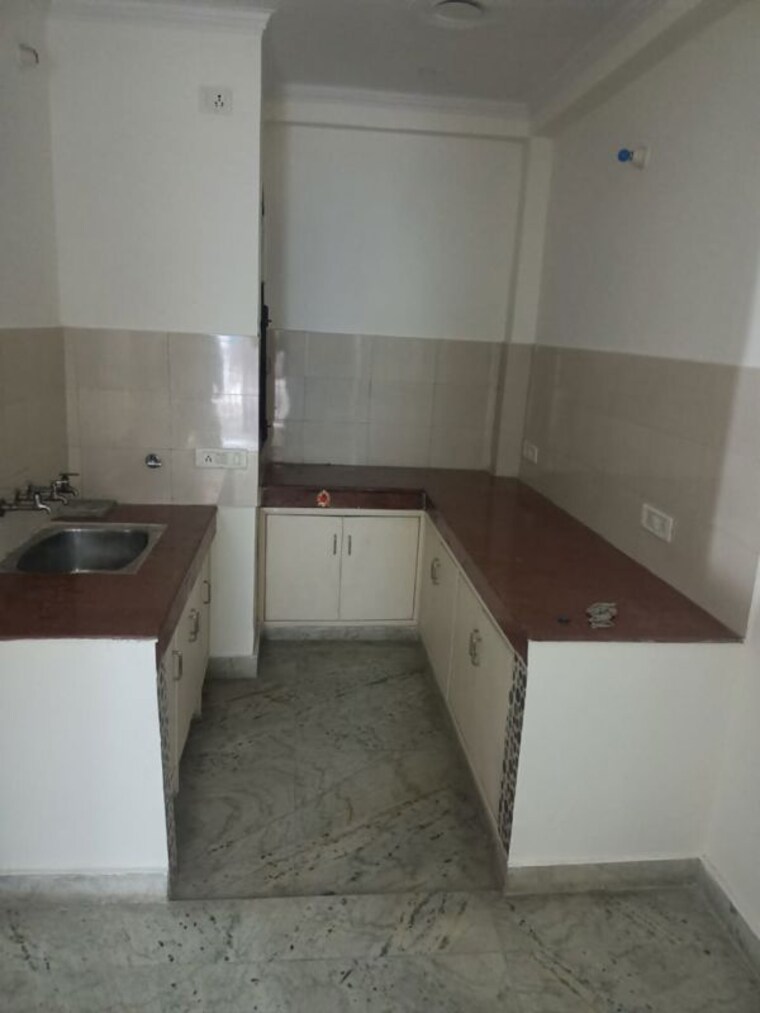 Kitchen, anil-suri-group-residency-23 2.5 Bedroom 750 Sq.Ft. Independent House In Sector 23 Gurgaon 10438579