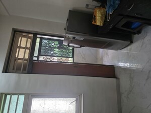 Kitchen in 2 BHK Apartment at Ram Janki Apartment, Vile Parle East – for Rent